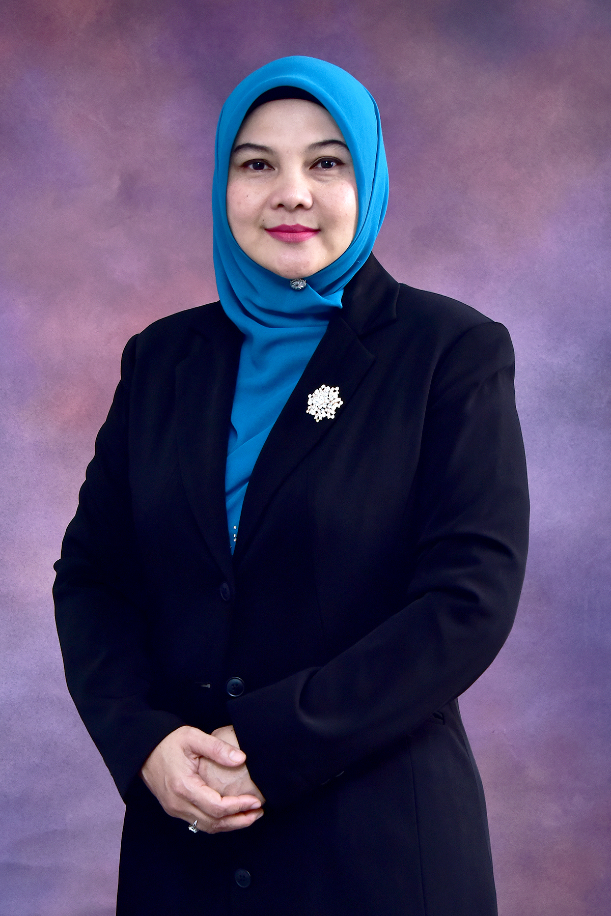 Madam Naaimah Binti Mat @ Ahmad Radzi, Executive Director, Finance Division